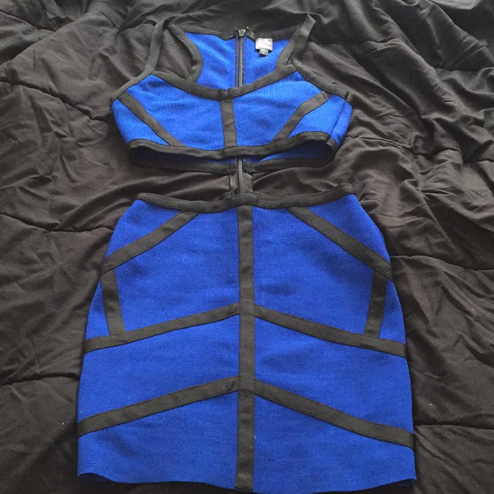Bebe blue and black cutout bandage dress size US S
